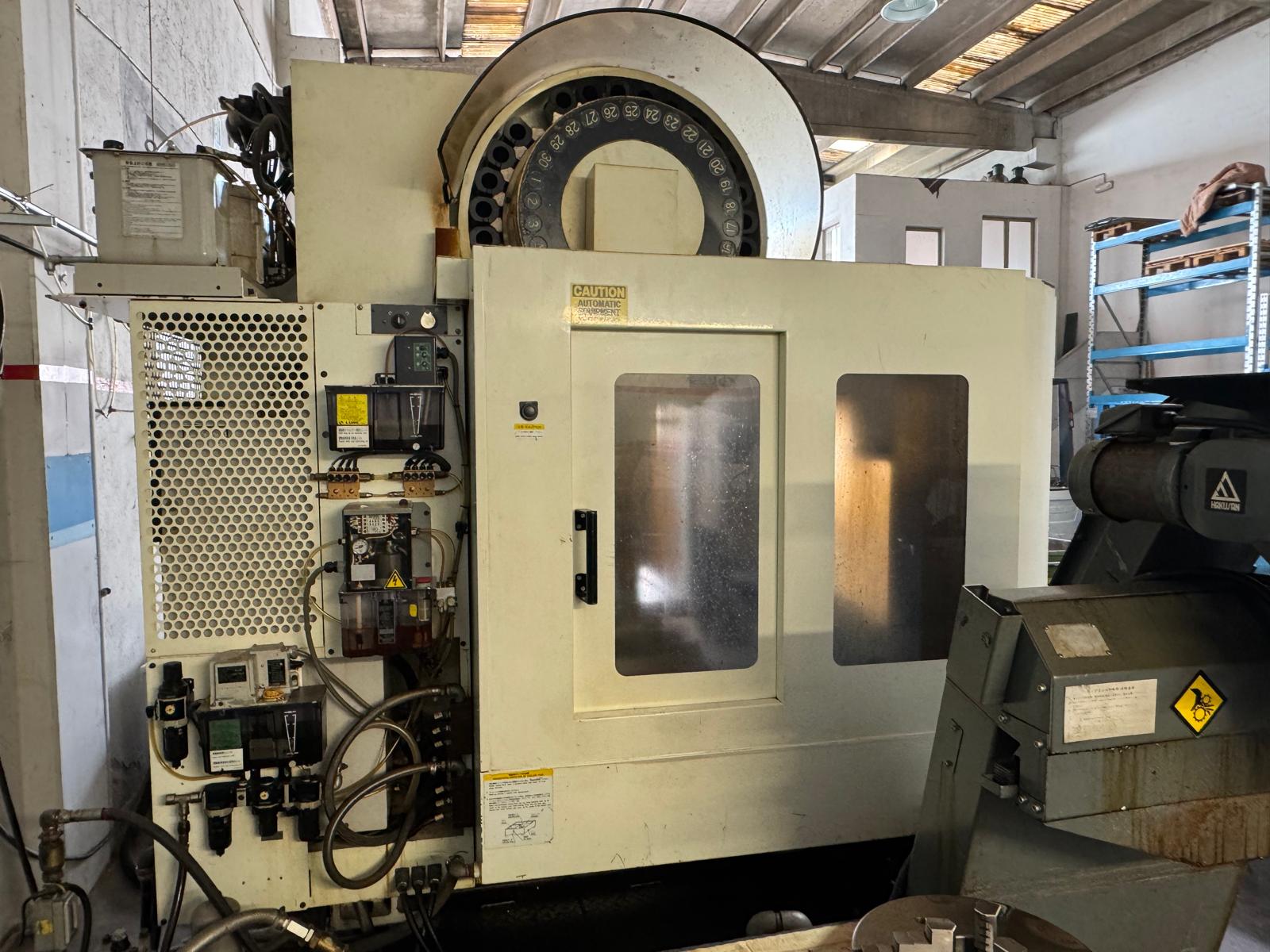 Vertical machining center KITAMURA M3XI SPARK CHANGER